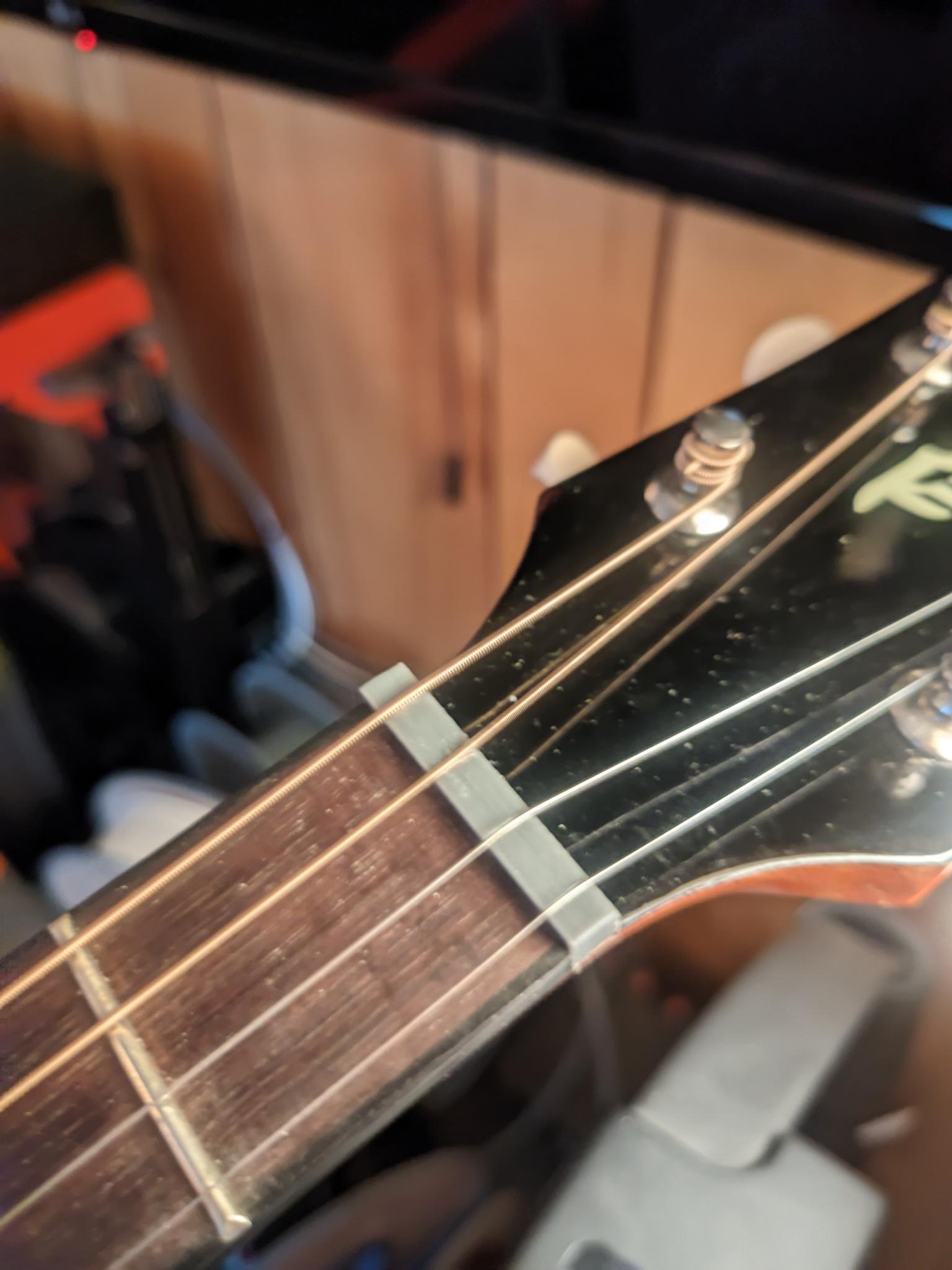 My plastic nut on a tenor guitar