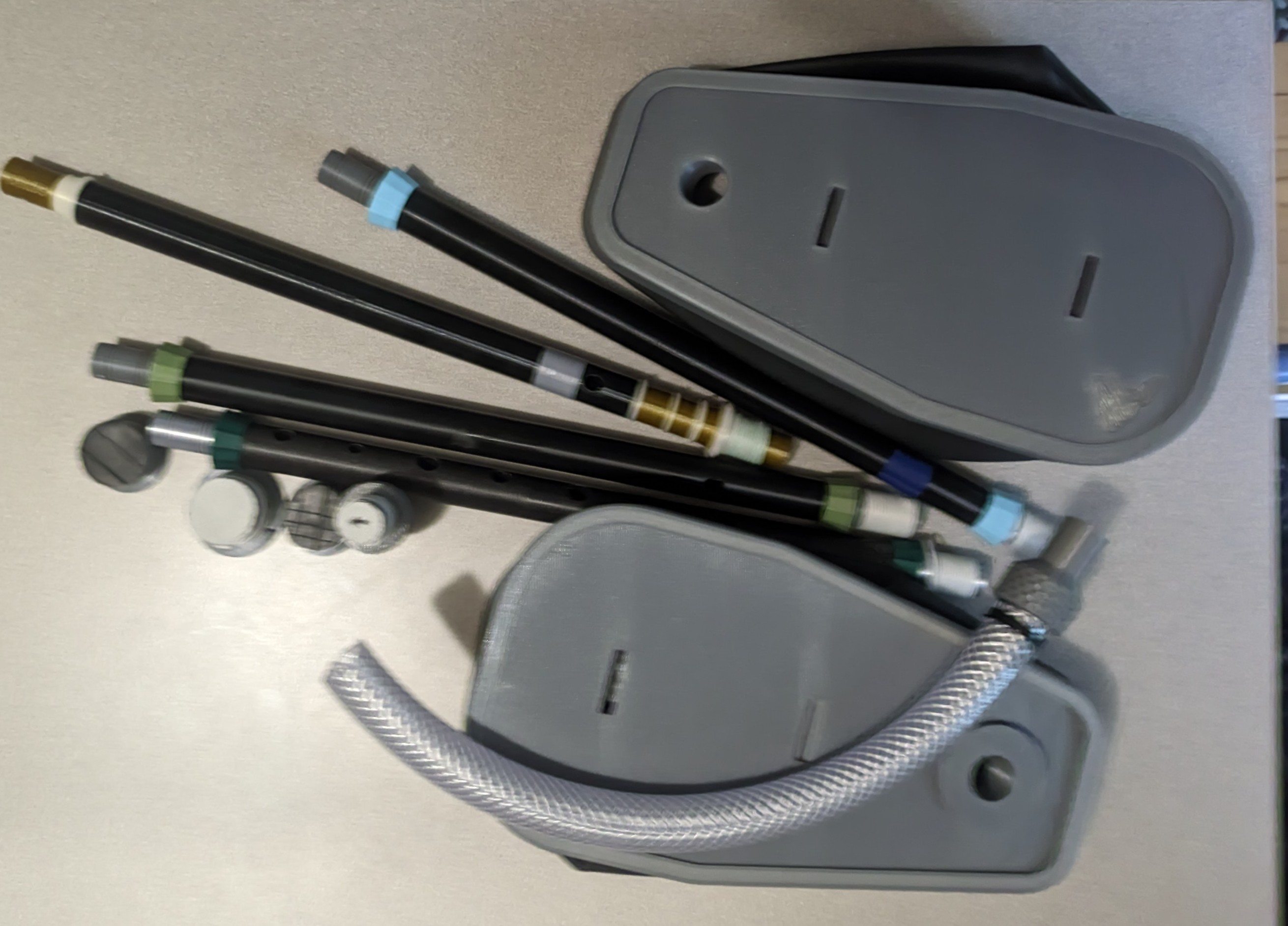 A bunch of plastic bagpipe pieces that weren't good enough