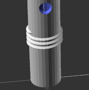 the bottom of a chanter, with threads for skirts