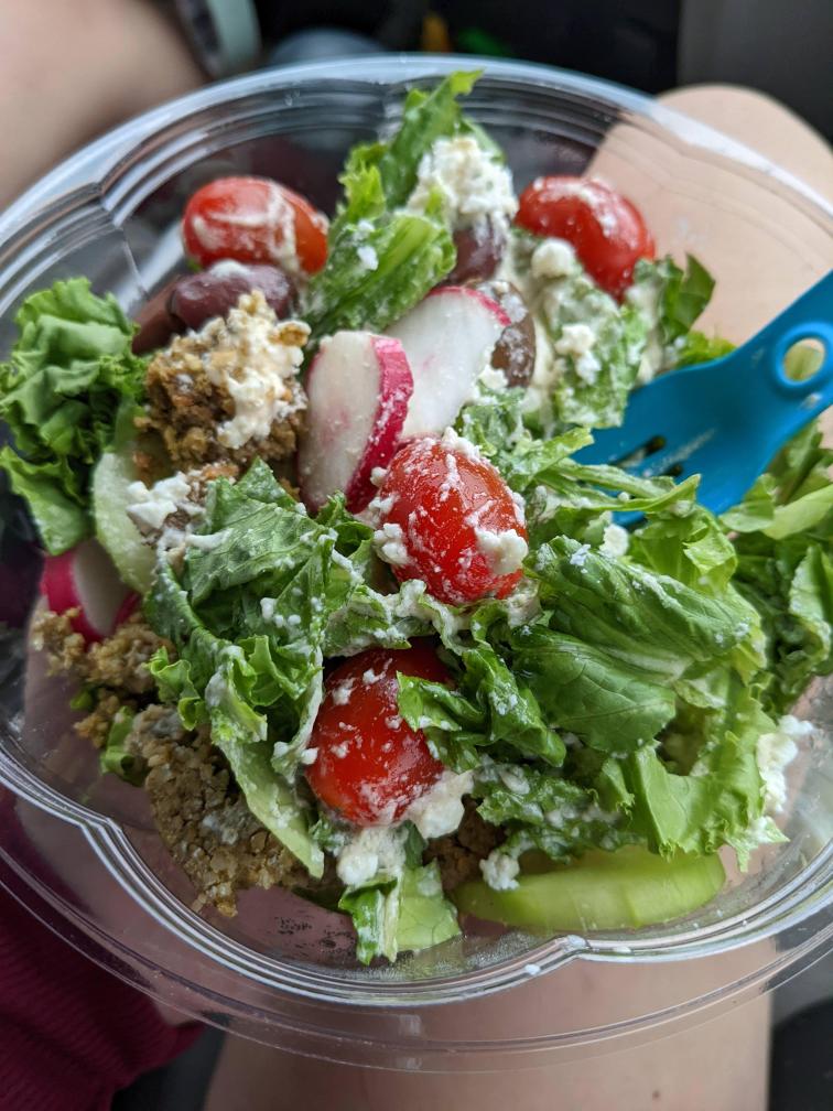 Salad with falafel, cheese, radishes, tomatoes